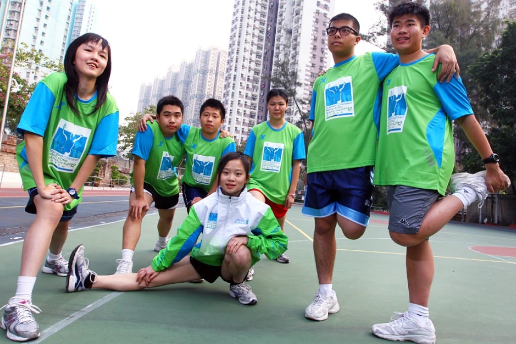 Mildly mentally handicapped student runners from HHCKLA Buddhist Po Kwong School joining the Standard Chartered Hong Kong Marathon in 2013. Photo: May Tse