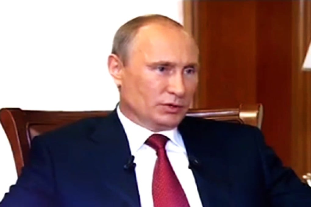 Putin openly discusses Moscow's controversial grabbing of Crimea a year ago. Photo: Screengrab of Homeward bound