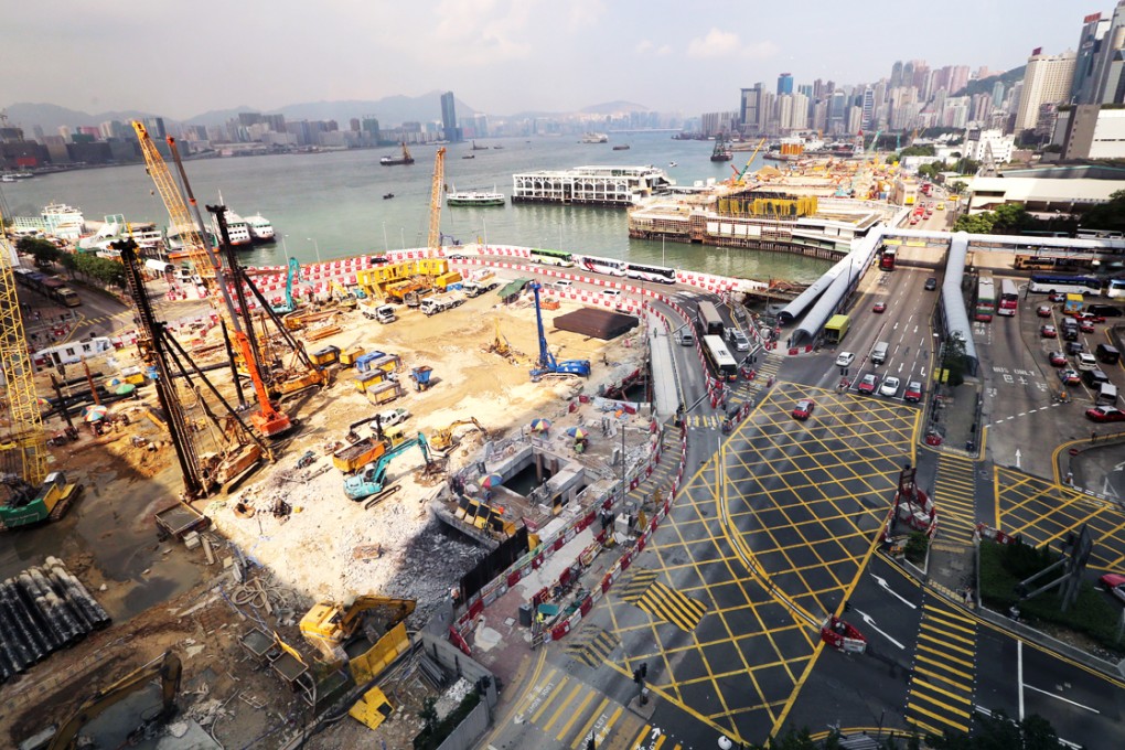 The construction site near Hong Kong Convention and Exhibition Centre in Wan Chai. Hong Kong will receive an estimated HK$45 billion of investment income this year. Photo: David Wong