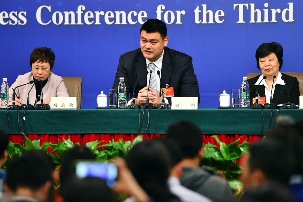 Yao Ming told reporters it was essential that schools be closely involved in the development of football in China. Photo: Xinhua