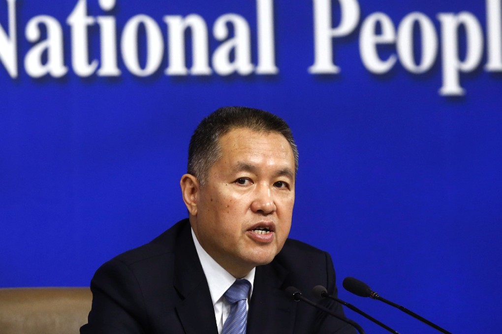 Zhang Mao, chief of the State Administration for Industry and Commerce, says there will be greater oversight of e-commerce sites in China. Photo: EPA