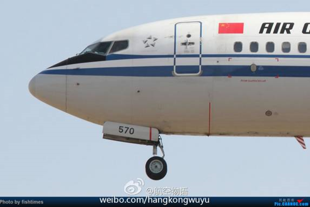 An emergency door lock appears to be open during an Air China flight. Photo: SCMP Pictures