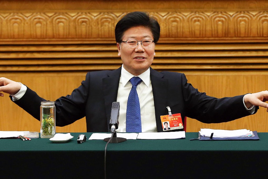 Zhang Chunxian addresses a meeting of the Xinjiang delegation in Beijing yesterday. Photo: EPA