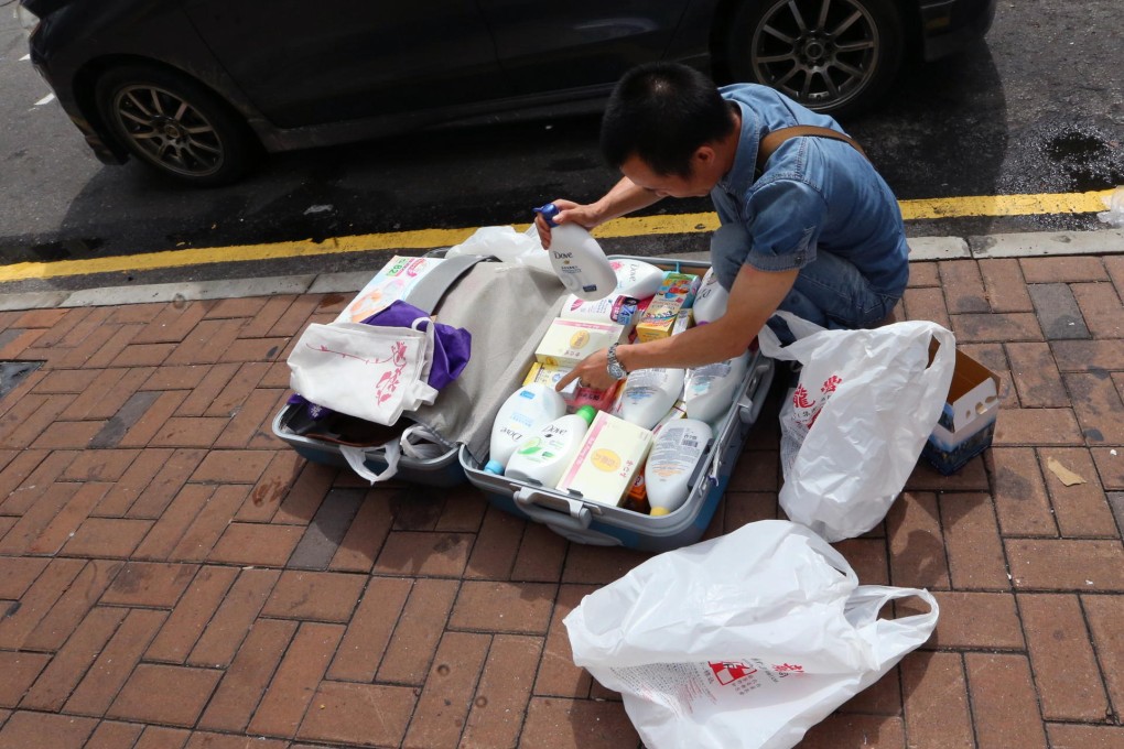 Goods being packed at Sheung Shui station. Photo: David Wong