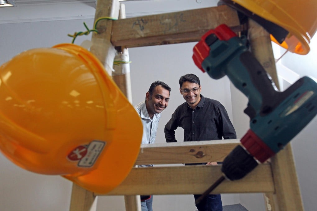 Jerry Sarai (left), business development manager of CallFixie and Jaspal Sarai, director of Jaarwis, say their company isn't taking a cut of its Hong Kong business - yet. Photo: May Tse