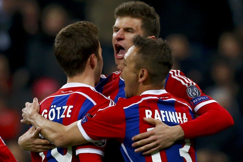 Thomas Mueller celebrates with teammates. Photo: Reuters