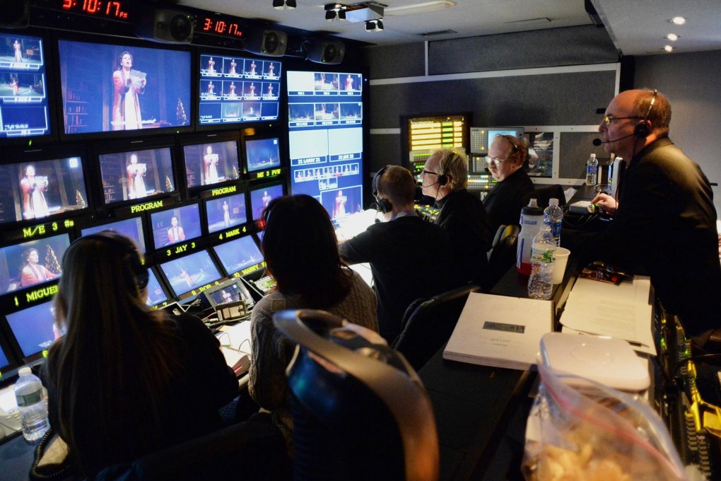 Met general manager Peter Gelb (right) directs a broadcast. Photo: AFP