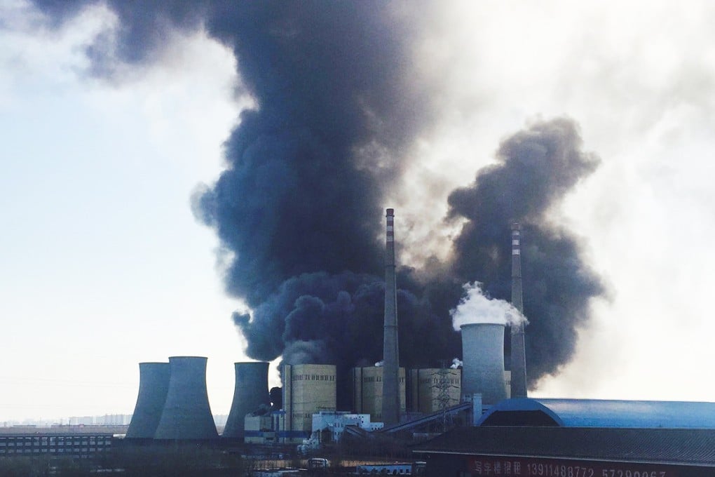 Smoke rises from the Huaneng power plant in Beijing. Photo: Reuters