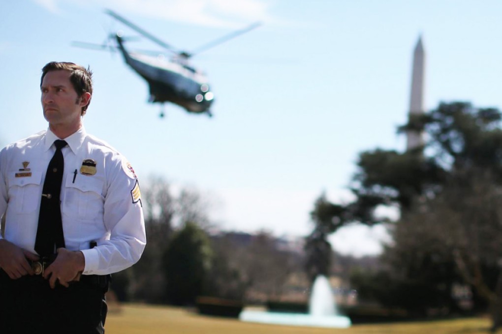 Secret Service agents stand guard at the White House. Photo: EPA
