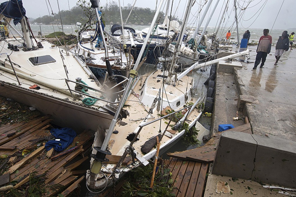 Boats damaged by Cyclone Pam in the Vanuatu capital of Port Vila. Photo: AP