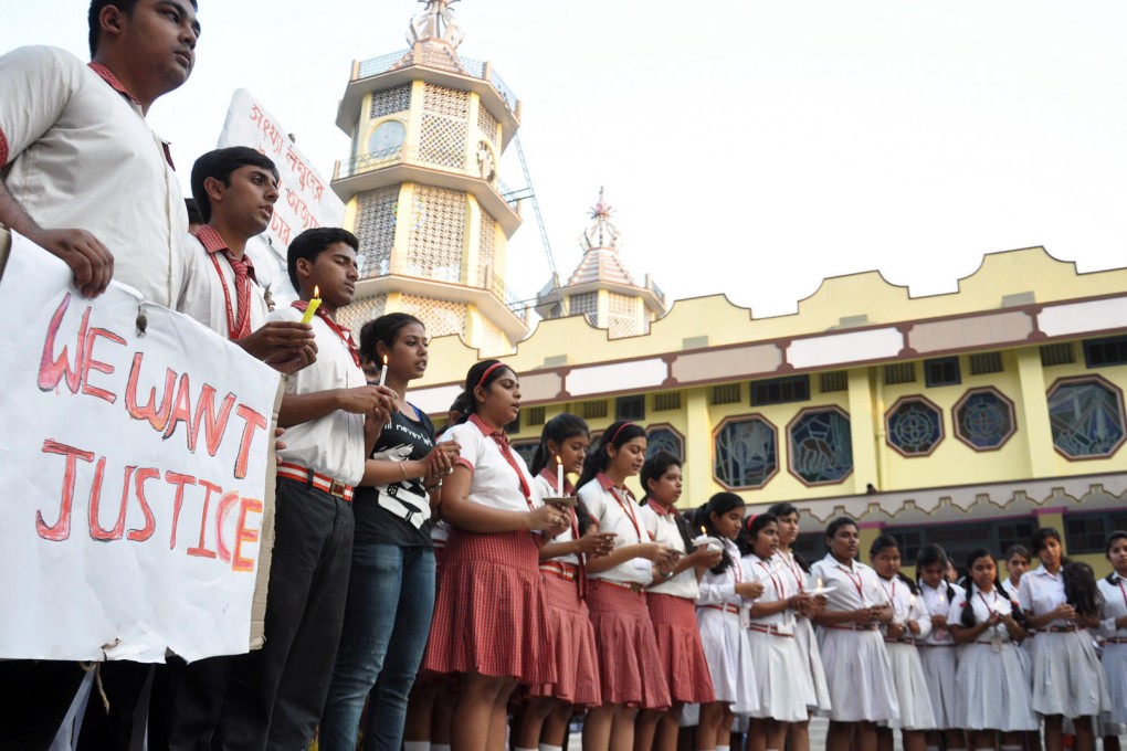 Students protest against the gang-rape of a nun, who tried to prevent her attackers from robbing her convent. Photo: AP