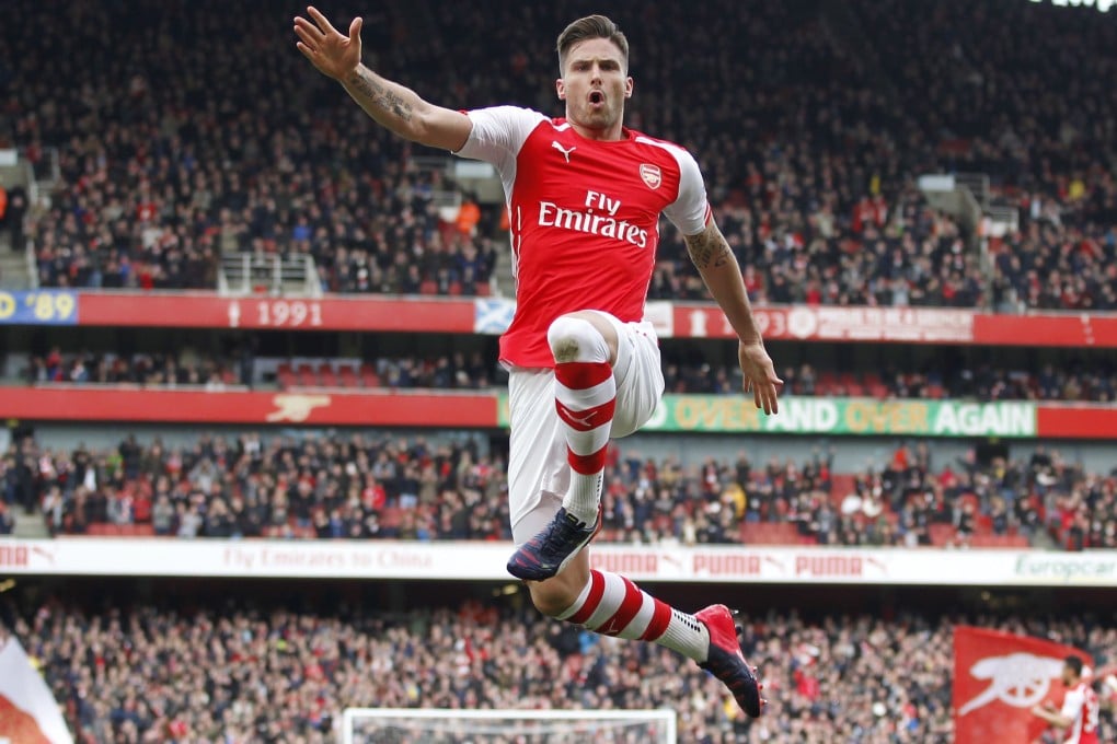 French striker Olivier Giroud celebrates in style after scoring for Arsenal in their 3-0 win over West Ham United at the Emirates Stadium in London. Photo: AFP