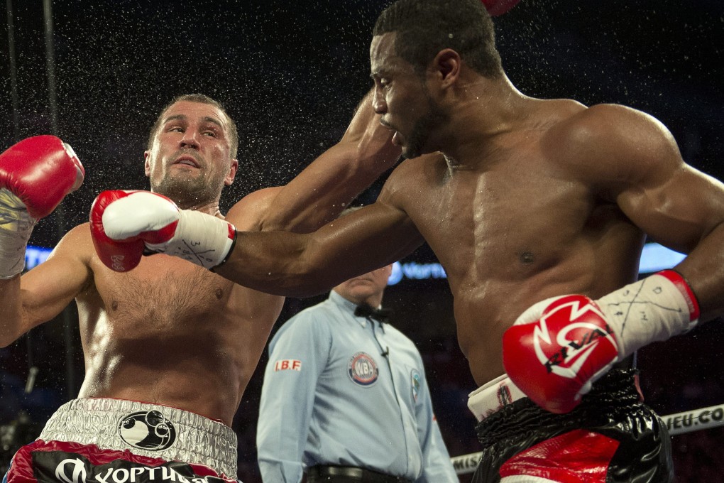 Sergey Kovalev trades punches with Jean Pascal during their light heavyweight bout in Montreal. Photos: AP