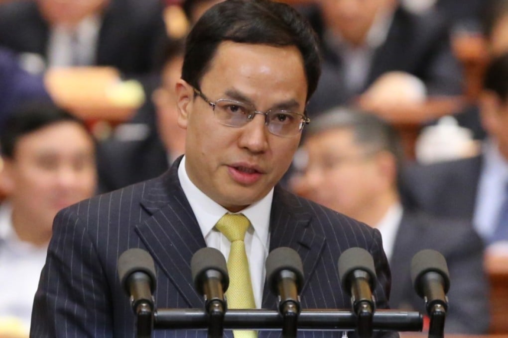 Li Hejun, boss of Hong Kong-listed solar energy company Hanergy, speaks at the CPPCC. Photo: Xinhua