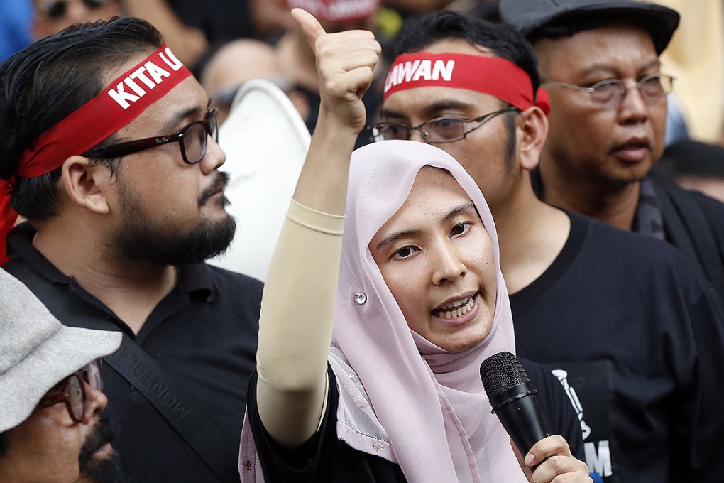 Nurul Izzah, daughter of jailed Malaysian opposition leader Anwar Ibrahim, addresses a crowd during a rally to protest against his imprisonment in Kuala Lumpur on March 7. Photo: Reuters