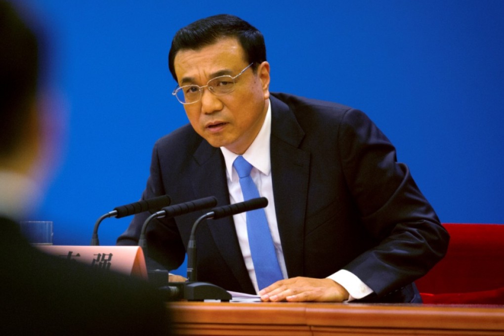 China still a developing nation, says Premier Li Keqiang as he signals country's plan to focus inwards