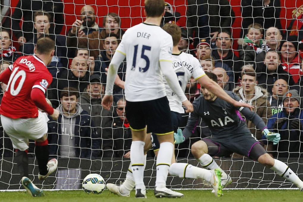 Wayne Rooney scores the third goal for Manchester United  against Tottenham. Photo: Reuters