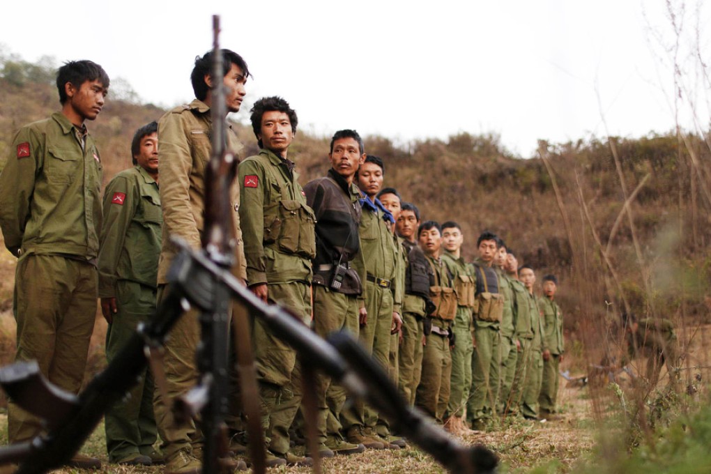 Rebel soldiers of Myanmar National Democratic Alliance Army (MNDAA) gather at a military base in Kokang. Photo: Reuters