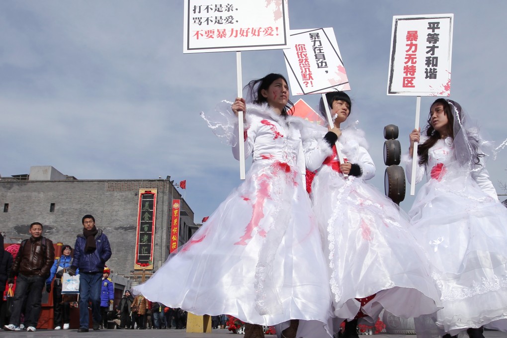 A protest against domestic violence in Beijing in 2012 involving Li Tingting (left) and Wei Tingting (right), two of the activists now detained. Photo: Simon Song