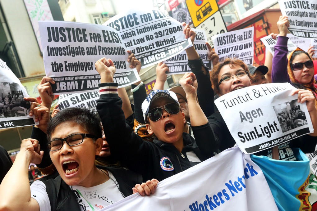 Workers groups protest at the Sunlight Employment Agency, where Elis Kurniasih was crushed, on Tuesday in North Point. Photo: David Wong