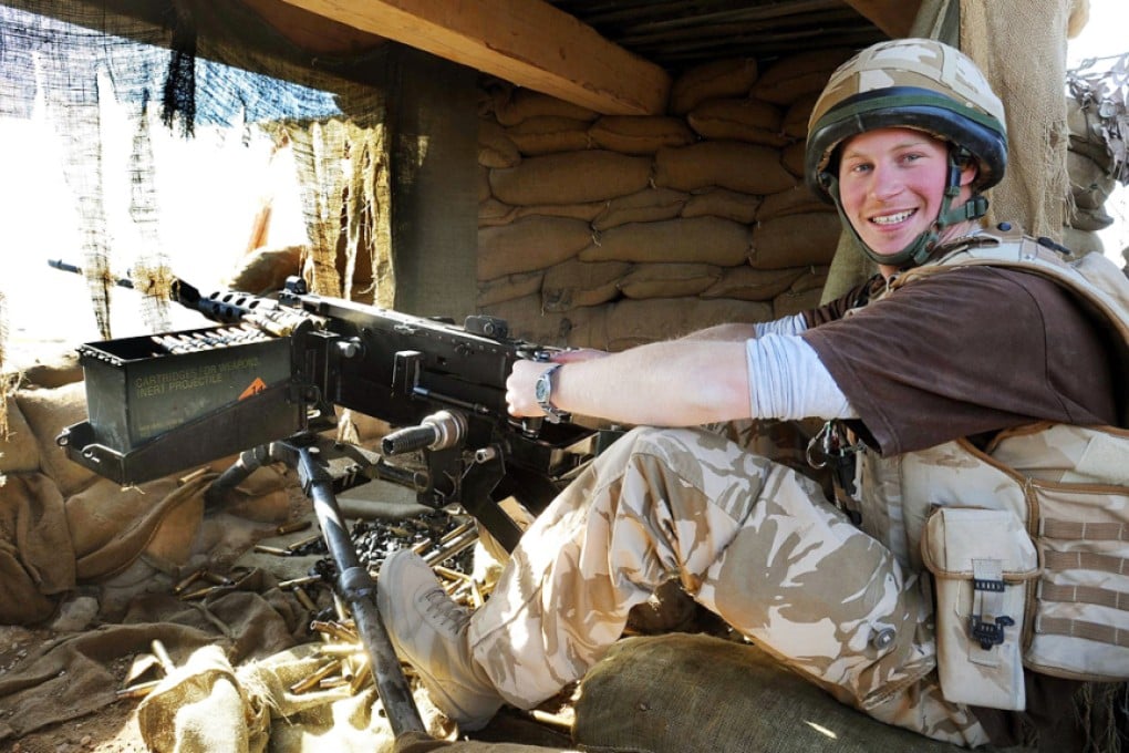 Britain's Prince Harry mans a 50 calibre machine gun on the observation post at JTAC Hill in Helmand province, southern Afghanistan in this January 2, 2008 file photo. Photo: Reuters