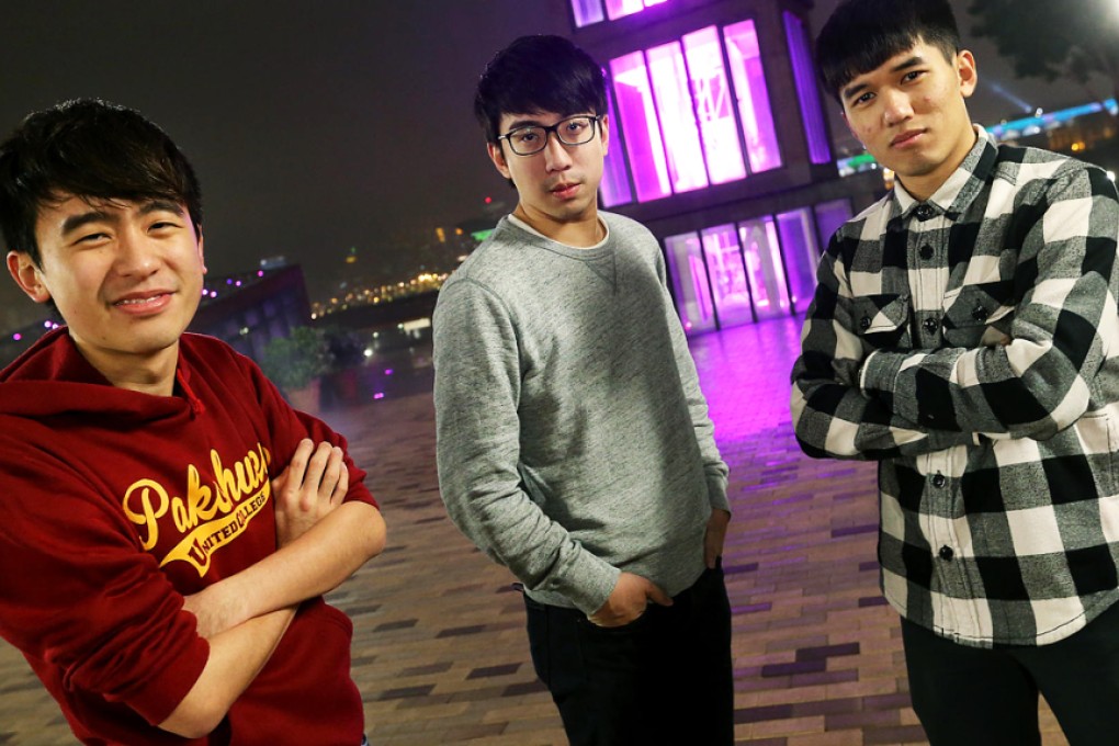 One Letter Horse members (from left) Jonathan Ho Chi-yan, Angus Kwok Hei and Chan Ka-ming discuss their tongue-in-cheek video about traders in Sheung Shui. Photo: K.Y. Cheng