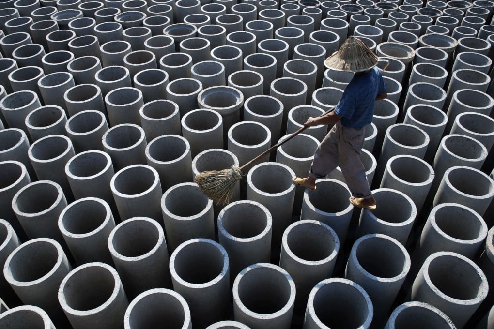 A group of six minority shareholders of Shanshui Cement has applied for permission to take legal action in Hong Kong against Shanshui Cement, CNBM, Shanshui chairman Zhang Bin and his father, Shanshui executive director Zhang Caikui. Photo: Reuters