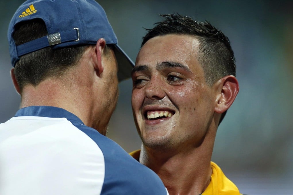 South Africa's Quinton de Kock (right) gets a hug from teammate Dale Steyn after he hit the winning boundary. Photo: Reuters