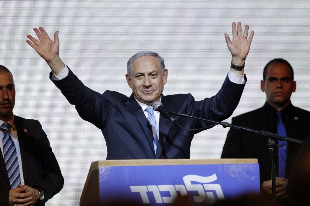 Israeli Prime Minister Benjamin Netanyahu waves to supporters at the party headquarters in Tel Aviv early today. Photo: Reuters