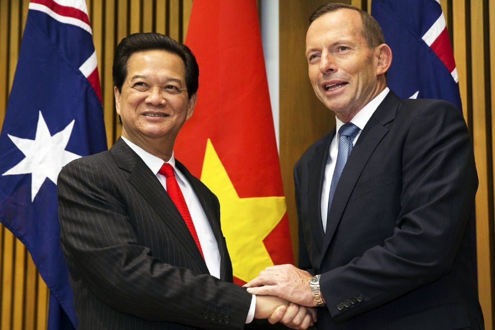 Vietnamese Prime Minister Nguyen Tan Dung meets Australiam Prime Minister Tony Abbott in Canberra to sign defence and climate change deals. Photo: AP