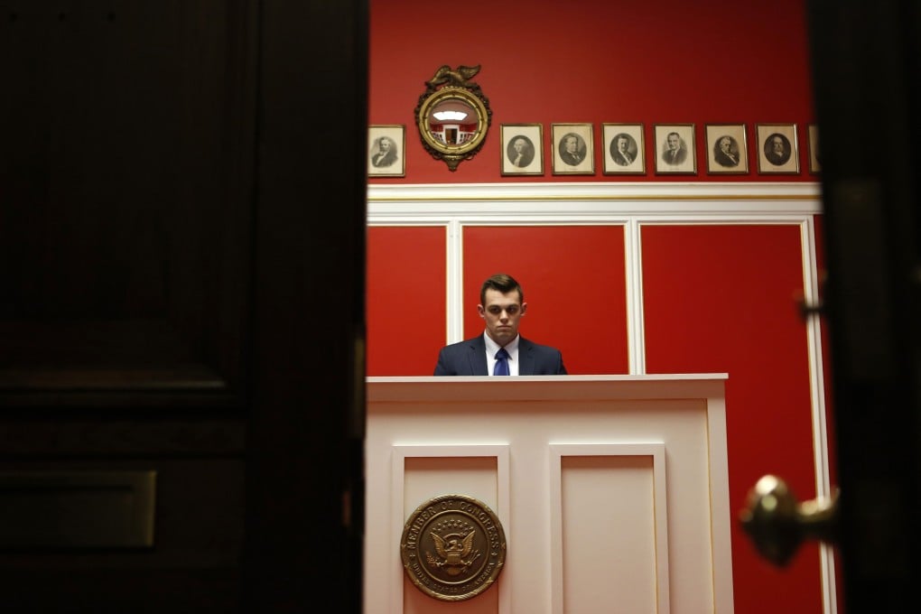 A staff member works at the office of Representative Aaron Schock on Capitol Hill in Washington. Photo: Reuters