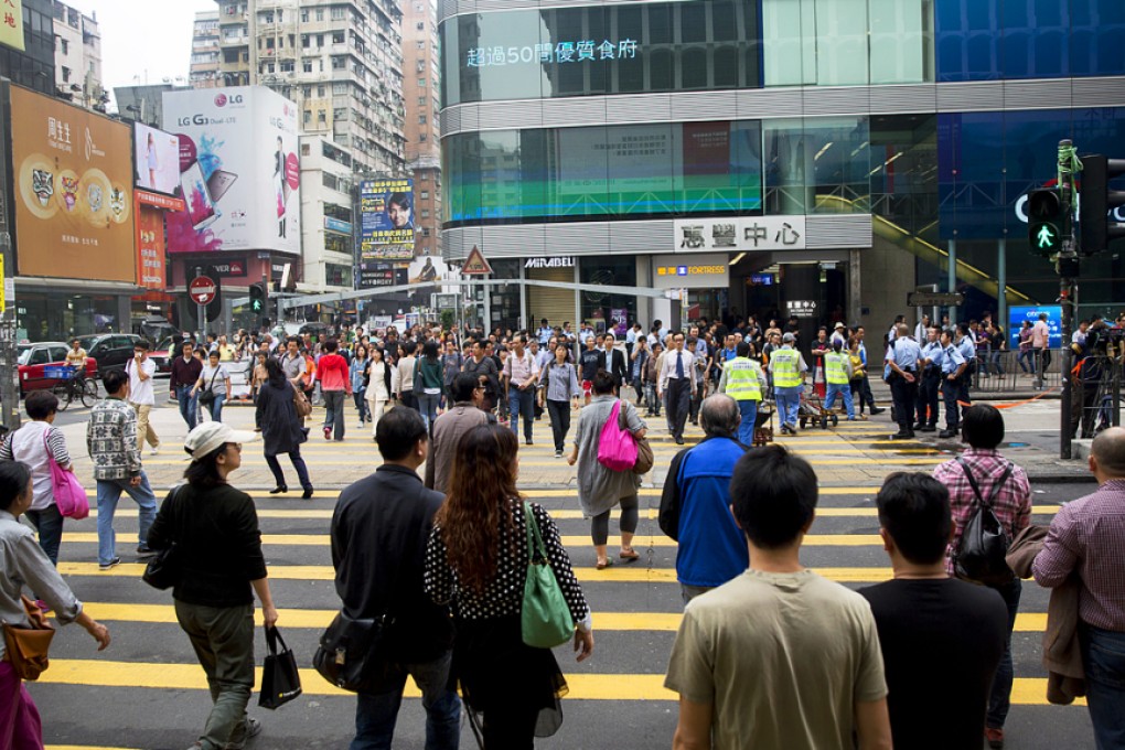 Nearly a quarter of Hong Kong's working population work 51.5 hours a week or longer. Photo: Bloomberg