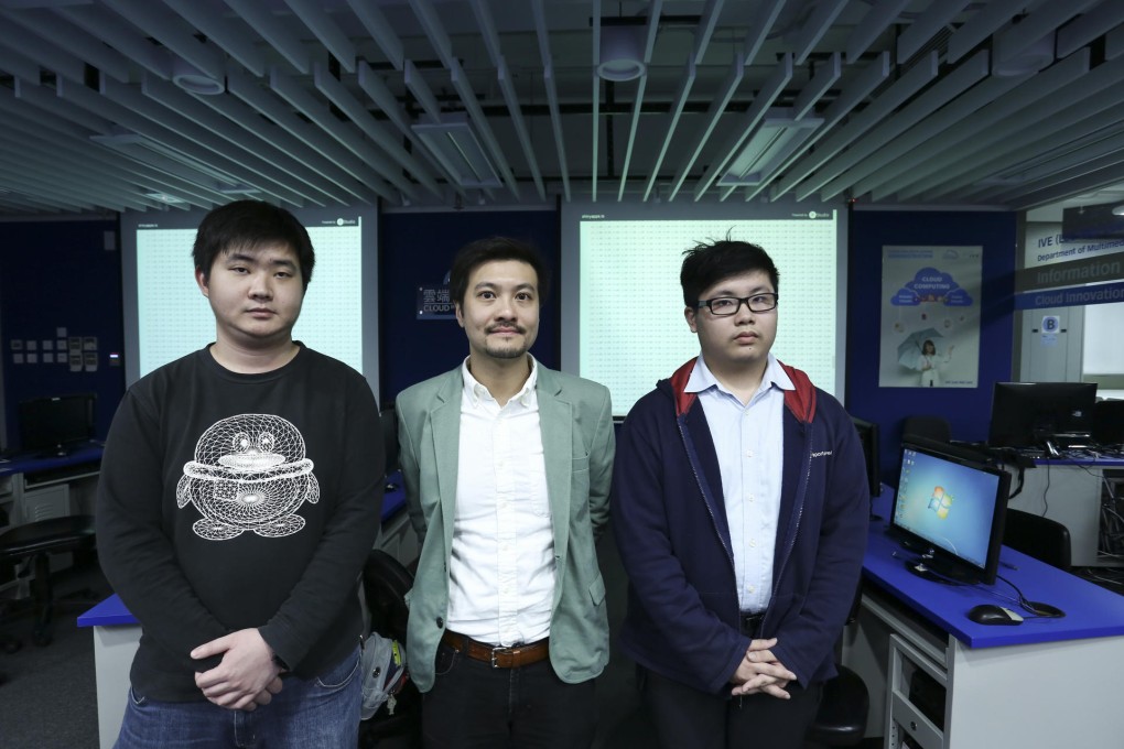 Cyrus Wong (centre)  Hong Kong Institute of Vocational Education.