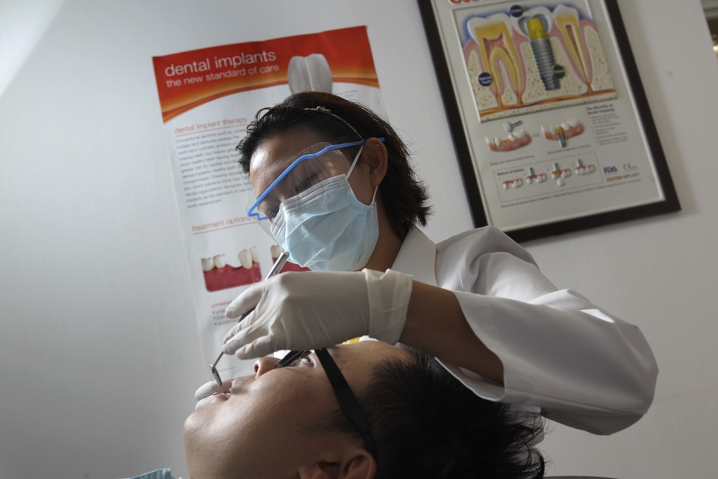 Employers should provide more comprehensive dental insurance, experts said. Photo: K. Y. Cheng