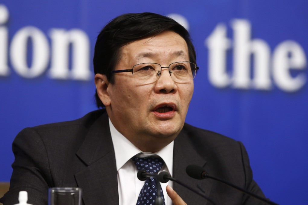 Finance Minister Lou Jiwei said countries including the OECD developed nations should trust Beijing's capability to reform and sustain its economy. Photo: EPA