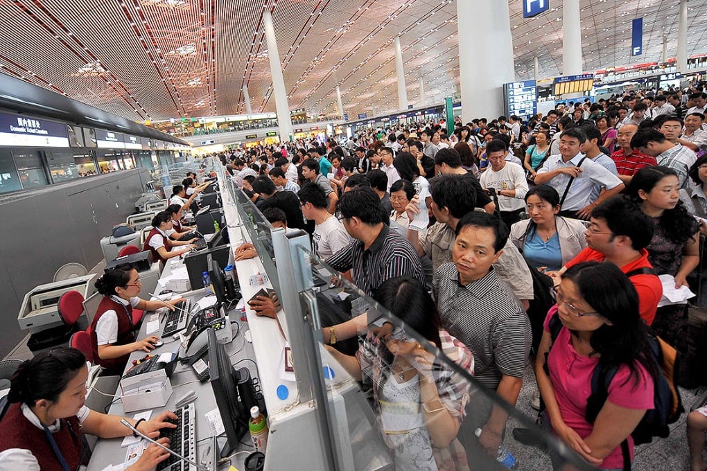 Huge check-in queues at Beijing Capital International Airport. Photo: Xinhua