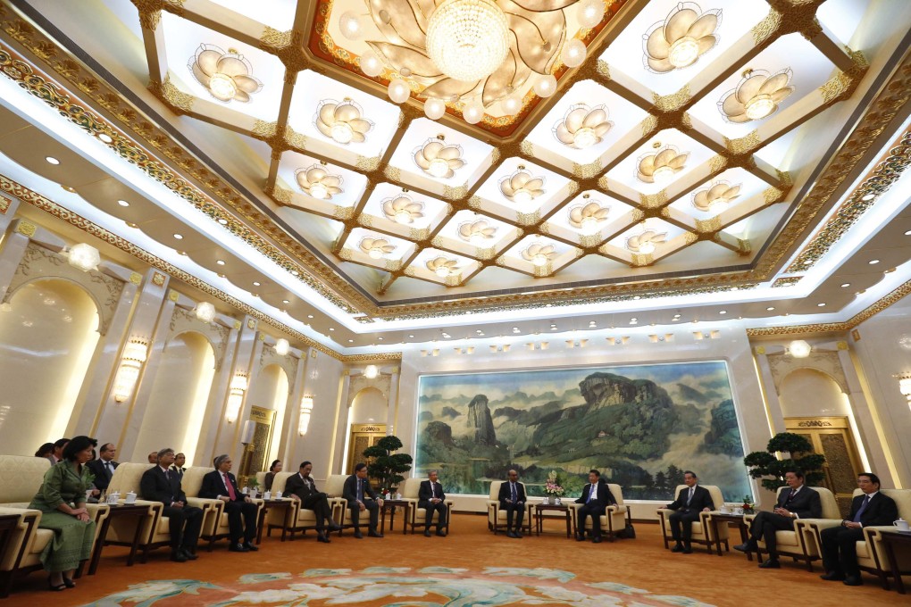 China's President Xi Jinping meets with the guests at the Asian Infrastructure Investment Bank launch ceremony at the Great Hall of the People in Beijing. Photo: Reuters