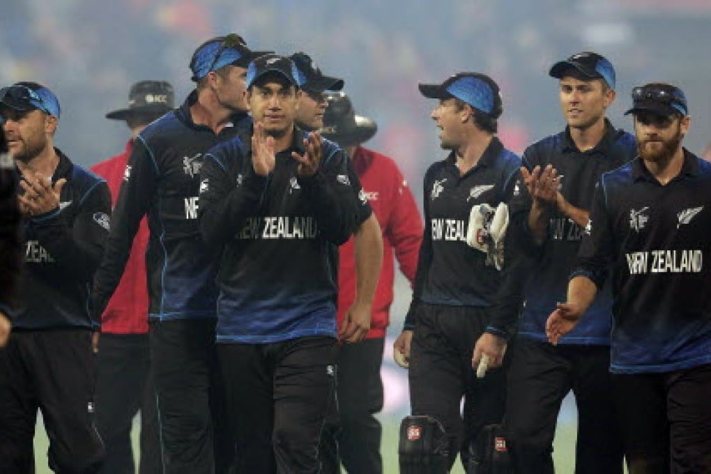 New Zealand players celebrate their victory over West Indies in the quarter-finals. Photo: Reuters