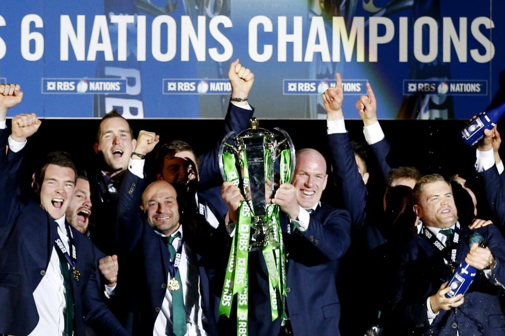 Ireland captain Paul O’Connell lifts the Six Nations trophy after a tumultuous final day. Photos: AFP