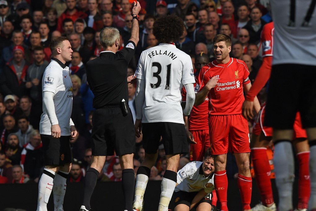 Steven Gerrard can't believe it after referee Martin Atkinson shows him the red card shortly after he came on as a substitute. Photo: AFP