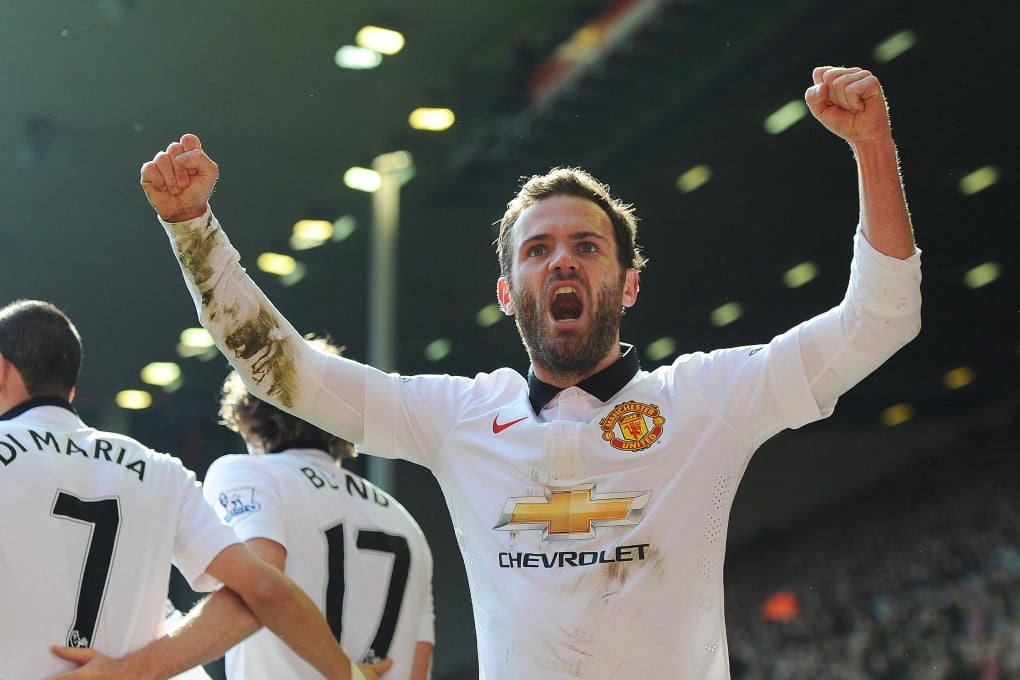 Manchester United's Juan Mata celebrates scoring his side's second goal against Liverpool. Photo: EPA