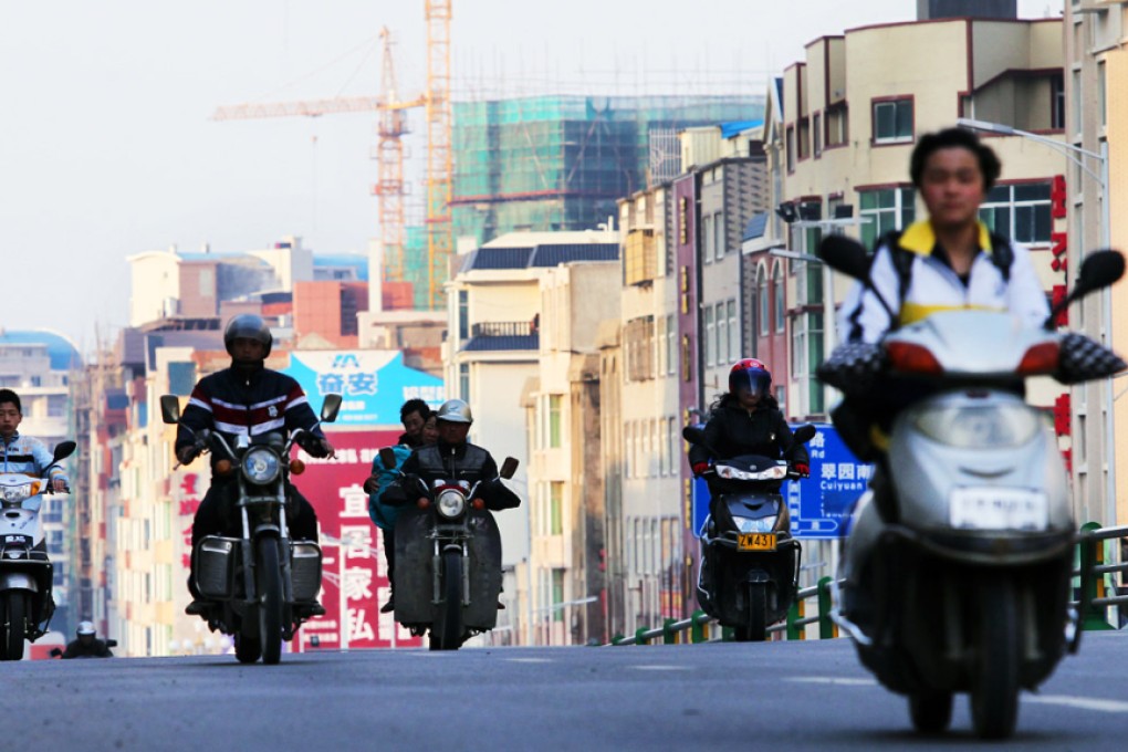 Fujian will buy developers’ inventories for use as new homes to families whose old ones are pulled down to make way for city redevelopment. Such a measure will reduce real estate investment, which directly drives about 15 per cent of China’s gross domestic product. Photo: Simon Song