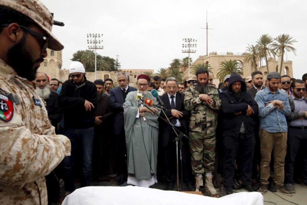 Mourners attend the funeral of Salah Burki, a Libya Dawn leader, at Martyrs' Square in Tripoli. Photo: Reuters