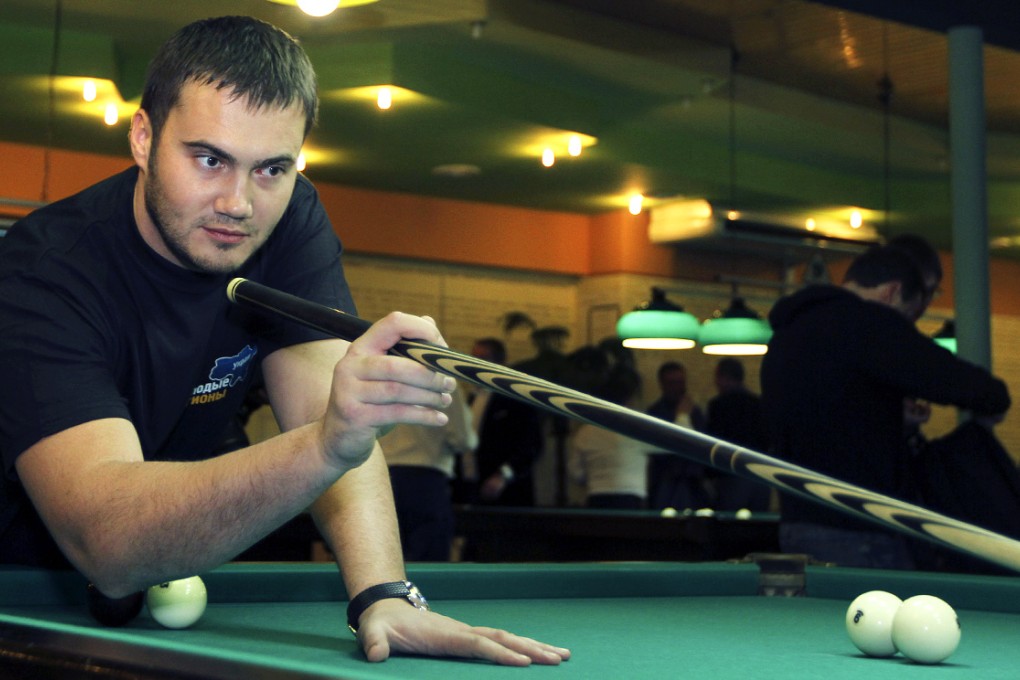 Viktor Yanukovych, son of of Ukraine's deposed president Viktor Yanukovych, plays billiard in Donetsk, Ukraine in 2010. Photo: AP
