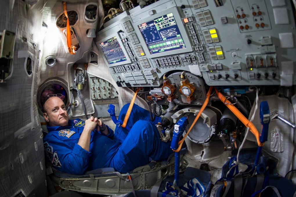 US astronaut Scott Kelly trains for the trip inside a Soyuz simulator at the Gagarin Cosmonaut Training Centre in Star City, Russia. Photo: AP