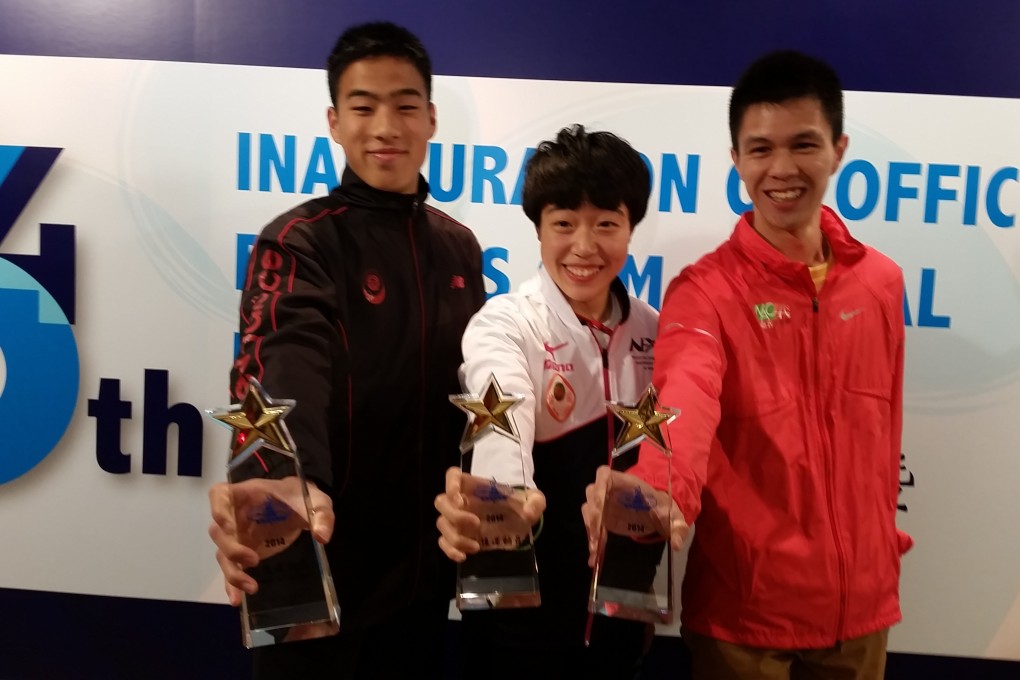Chan Ka-chun (right ) shares the stage with two junior athletes of the year winners, Lam Ho-yan (middle ) and Chan Ming-Tai (left). Photo: SCMP Pictures