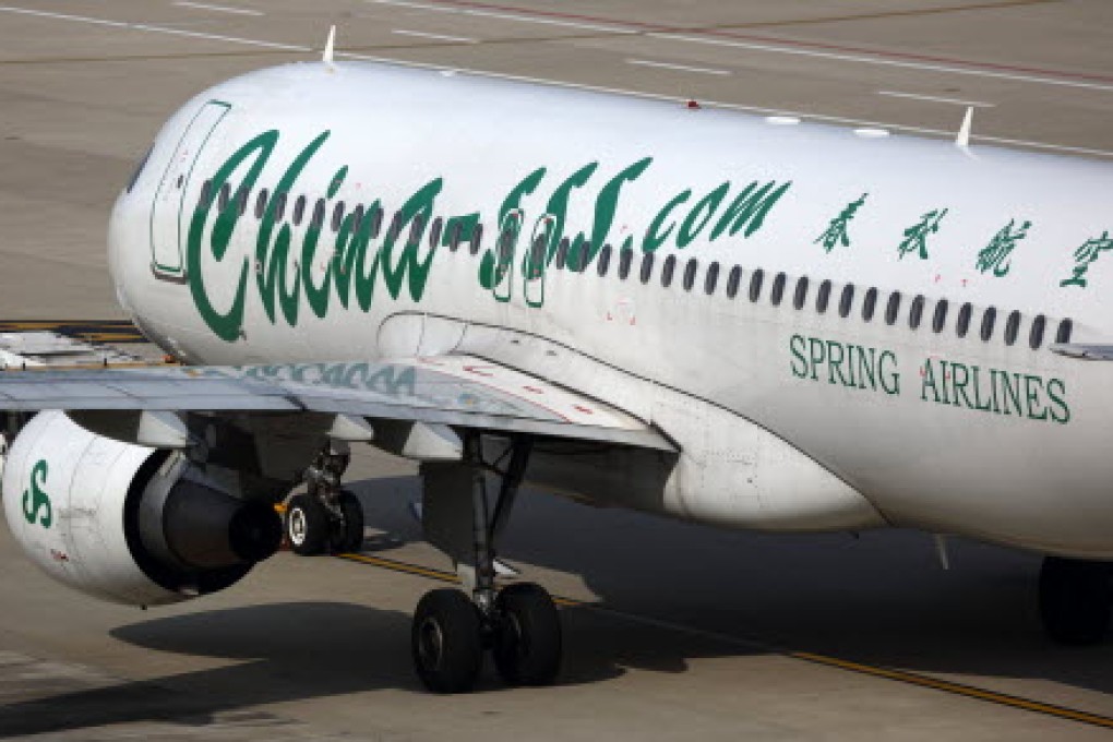 Spring Airlines plans to double its fleet to 100 aircraft by 2018. Photo: Bloomberg