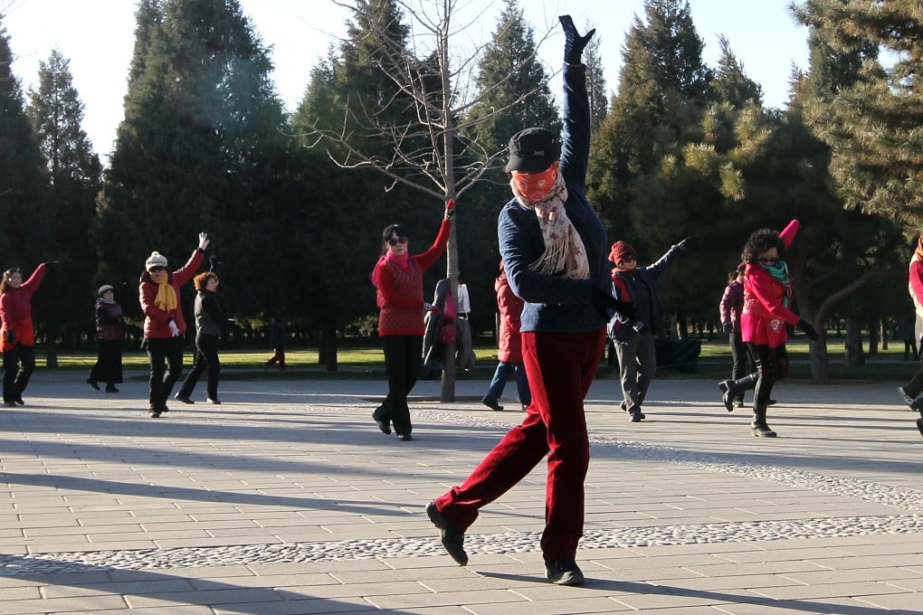 Retirees dance in Beijing's Tiantan Park. Photo: Simon Song