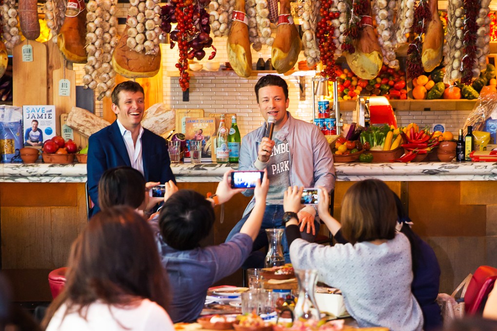 Celebrity chef Jamie Oliver (right) and Big Cat Group CEO William Lyon (left) at Jamie's Italian Hong Kong. Photo: SCMP Pictures