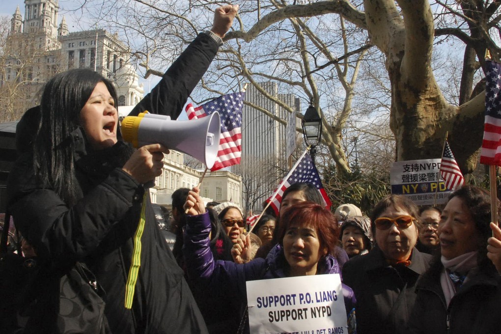 Protesters mobilised through WeChat gather outside New York's City Hall in support of indicted policeman Peter Liang. Photo: Rong Xiaoqing